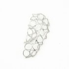 Handmadeˇanatomical filigree ear piece in 999 silver from above