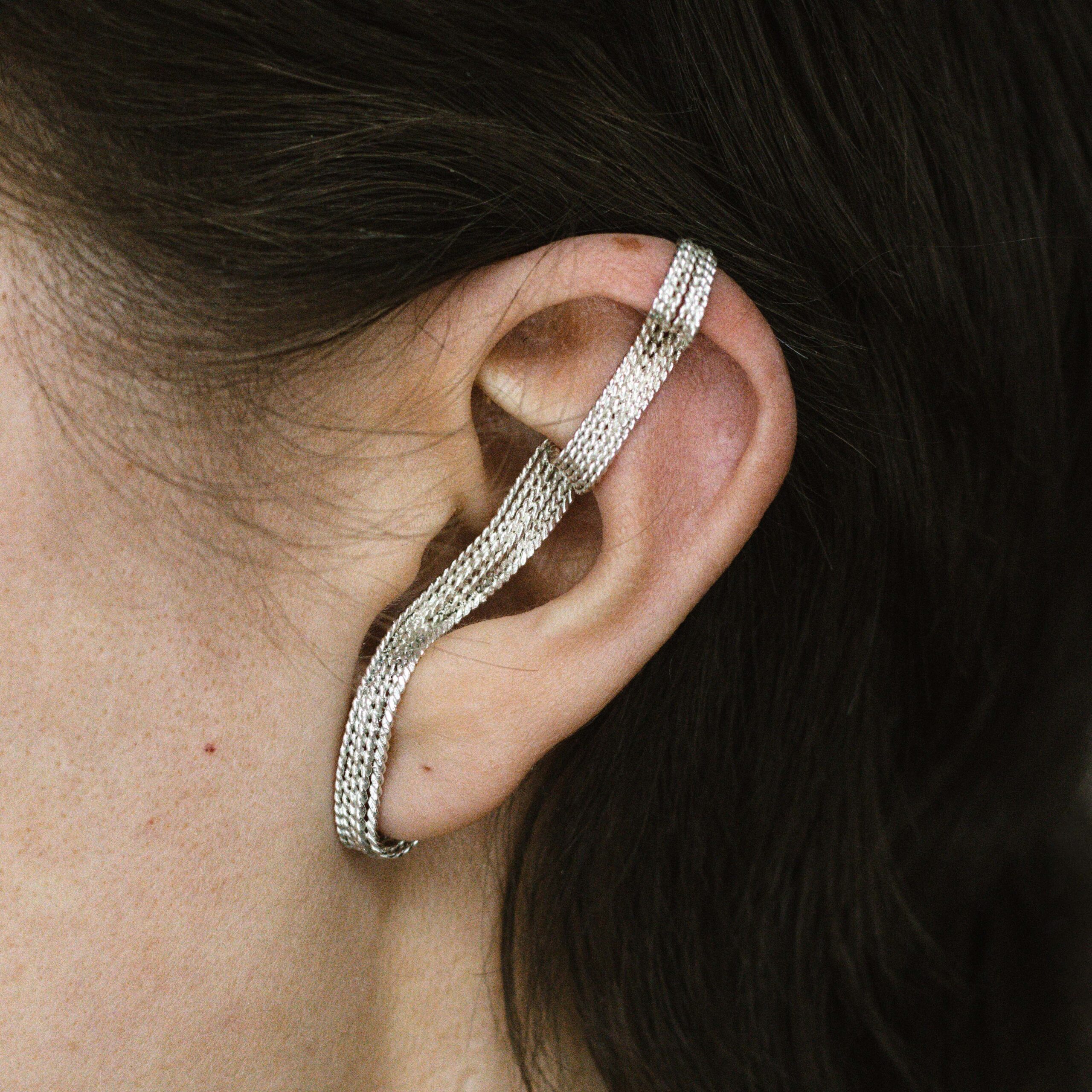 Handmadeˇanatomical filigree ear piece in 999 silver on ear