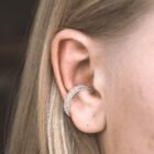 Handmade filigree ear cuff in sterling silver on the ear