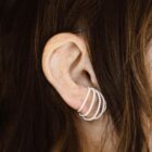 Handmade filigree ear cuff in sterling silver on the ear